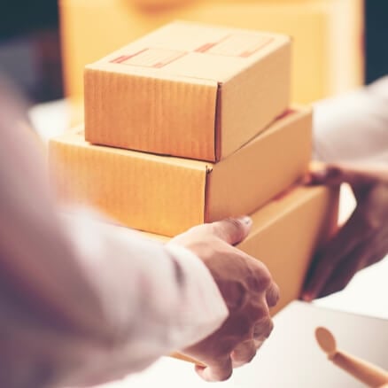 a person holding a box